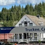 front of the tahoe star hotel with an Amtrak sign infront of it