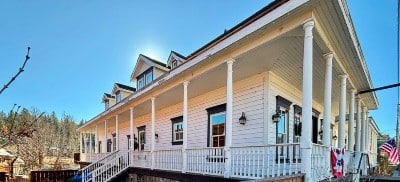 front of hotel, white with porch